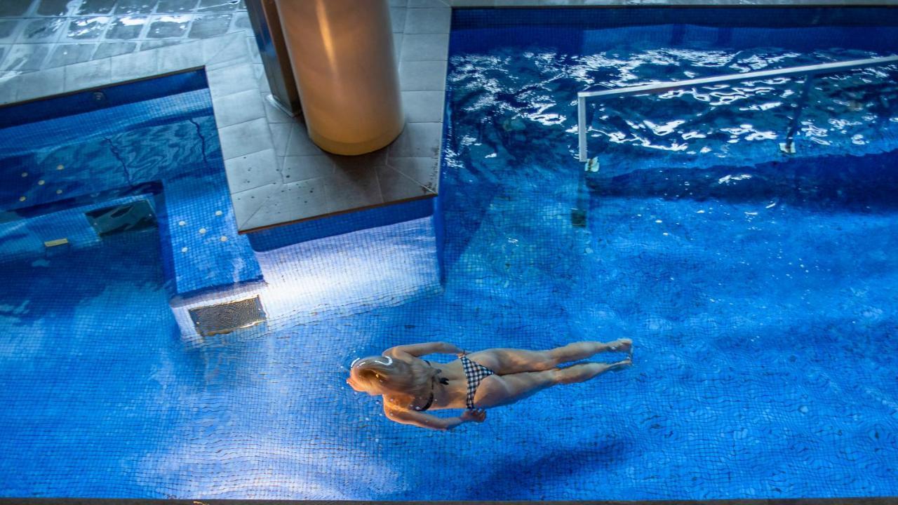 Sant Jordi Boutique Hotel Calella Bagian luar foto The pool at the Atlantis Paradise Island